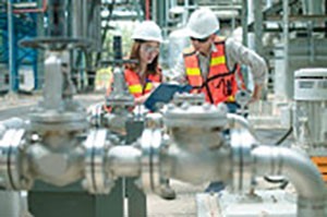 Workers performing a safety check in their facility